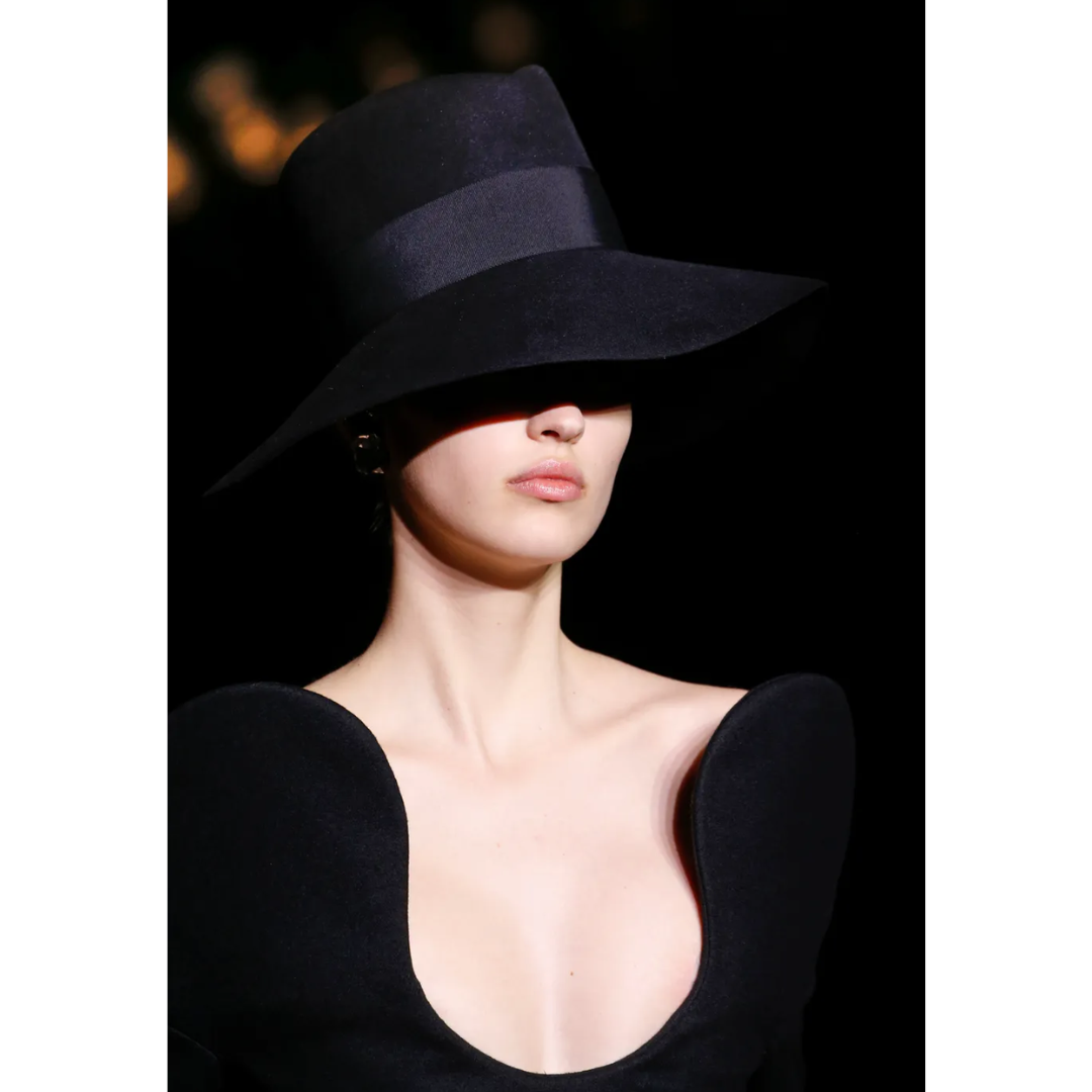 Saint Laurent FW 2018 by Anthony Vaccarello long black gown with sculptural shoulders
